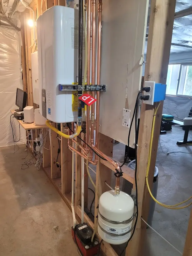 Licensed plumber repairing a kitchen sink in Gaithersburg